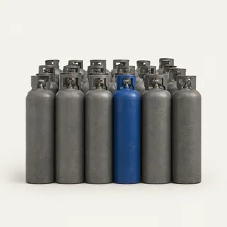 A close-packed block of grey gas cylinders with one cylinder in the front row picked out in blue.